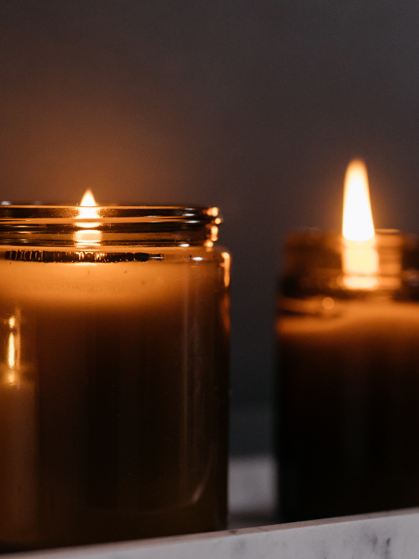 Roman grey co soy candle, side view